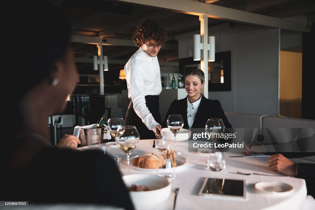 Business people dining in a luxury restaurant