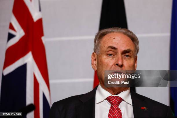 Australia's Trade Minister Don Farrell attends a press conference following a meeting with Chinese Commerce Minister Wang Wentao, May 12, 2023 in...