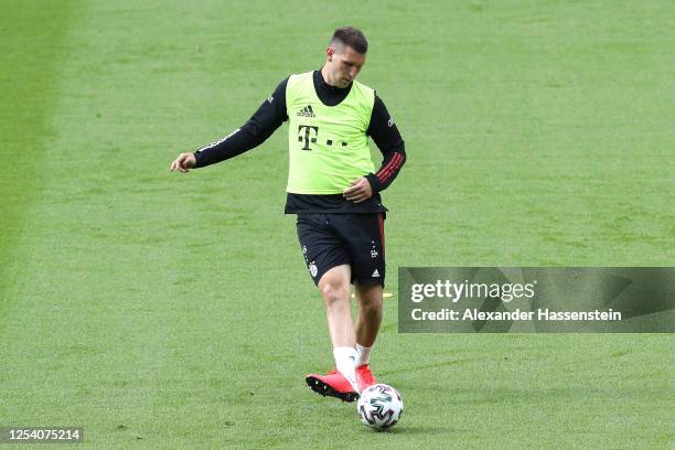 Niklas Suele of Bayern Muenchen plays the ball during a FC Bayern Muenchen training session ahead of DFB Cup 2020 final match against Bayer 04...