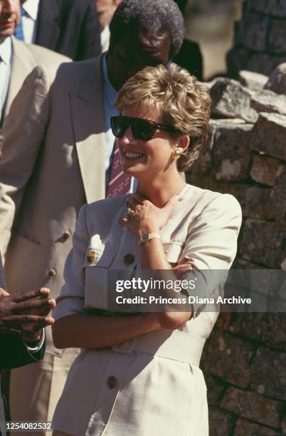 Diana, Princess of Wales visits the ancient site of Great Zimbabwe near Masvingo in Zimbabwe, 12th July 1993. She is wearing a safari suit by...