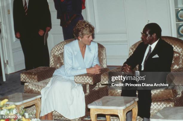Diana, Princess of Wales meets Zimbabwean President Robert Mugabe at State House in Harare, Zimbabwe, 10th July 1993.