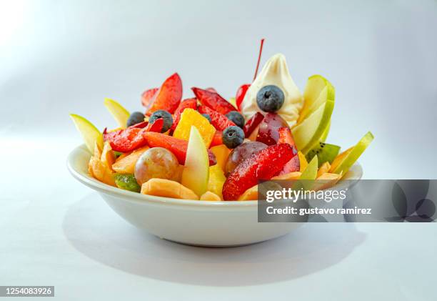 salad fruit dish - fruit bowl stock pictures, royalty-free photos & images