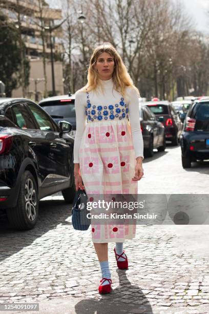 Model and fashion consultant Veronika Heilbrunner wears all Miu Miu on March 03, 2020 in Paris, France.