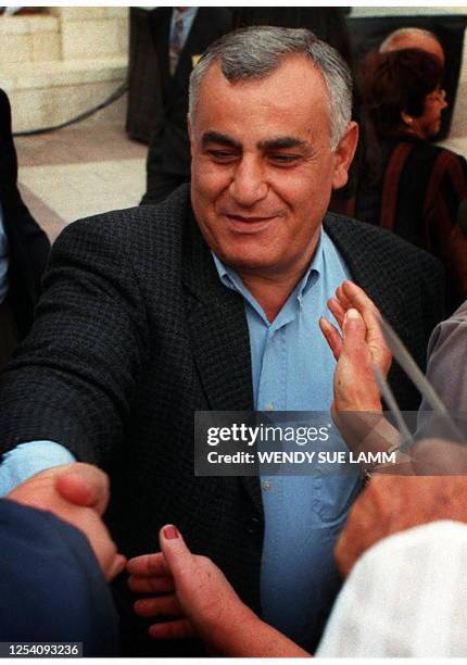 Picture dated 29 April 1997 of Israeli Defense Minister Yitzhak Mordechai getting a warm welcome during the Mimouna celebration in Jerusalem....