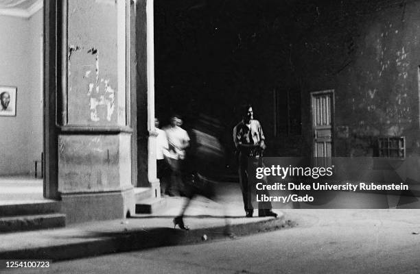 Street corner at night, Palma Soriano, Cuba, Santiago de Cuba , Palma Soriano , 1963. From the Deena Stryker photographs collection.