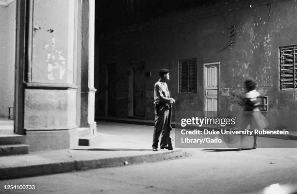 Street corner at night, Palma Soriano, Cuba, Santiago de Cuba , Palma Soriano , 1963. From the Deena Stryker photographs collection.