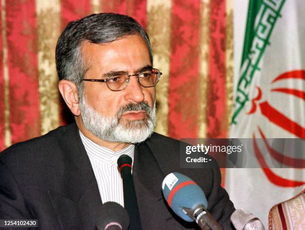 Iranian Foreign Minister Kamal Kharazi tells members of the press 22 July in Tehran that he was happy to see the reviewal of a case involving a...