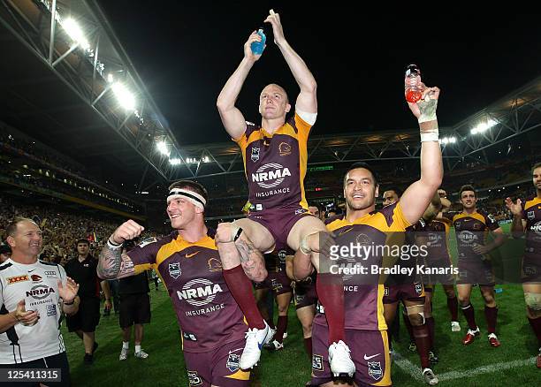 Darren Lockyer of the Broncos is chaired from the field in his final match in Brisbane after the NRL second semi final match between the Brisbane...