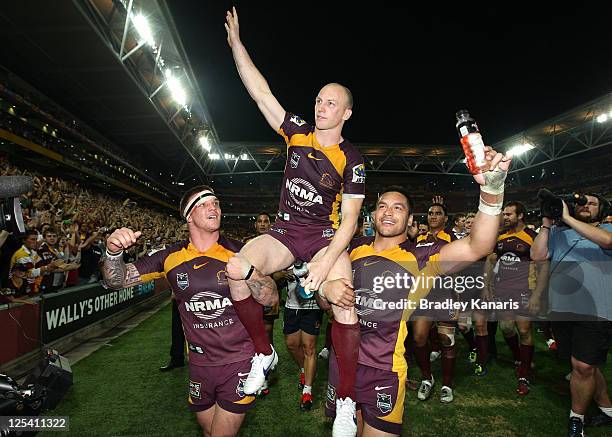 Darren Lockyer of the Broncos is chaired from the field in his final match in Brisbane after the NRL second semi final match between the Brisbane...