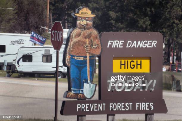 Sign outside of a ranger station describes the fire danger as high in the Black Hills near Mount Rushmore National Monument on July 03, 2020 in...