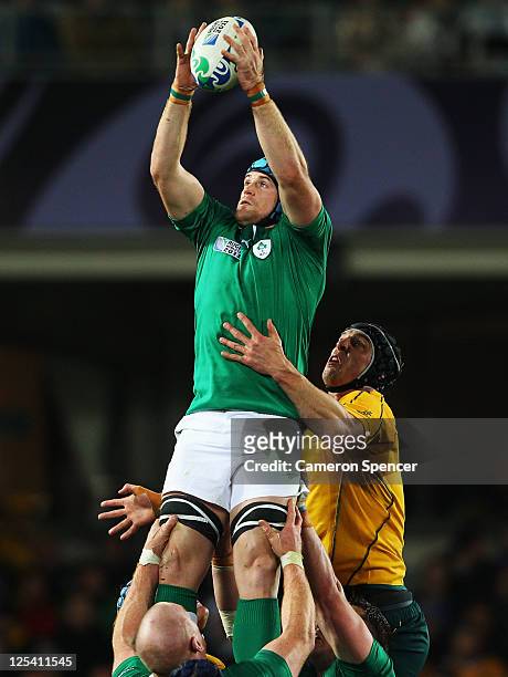 Jamie Heaslip of Ireland wins the lineout ball from Dan Vickerman of the Wallabies during the IRB 2011 Rugby World Cup Pool C match between Australia...