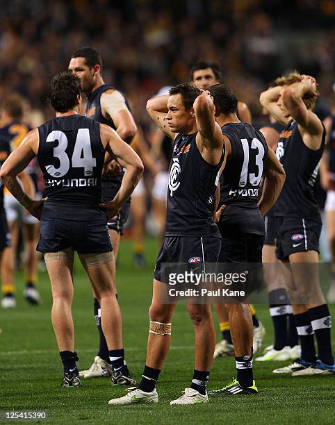 David Ellard of the Blus looks on dejected with team mates after being defeated during the AFL First Semi Final match between the West Coast Eagles...