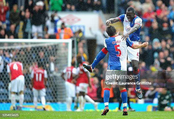 Chris Samba and Gael Givet of Blackburn celebrate after the fourth goal during the Barclays Premier League match between Blackburn Rovers and Arsenal...