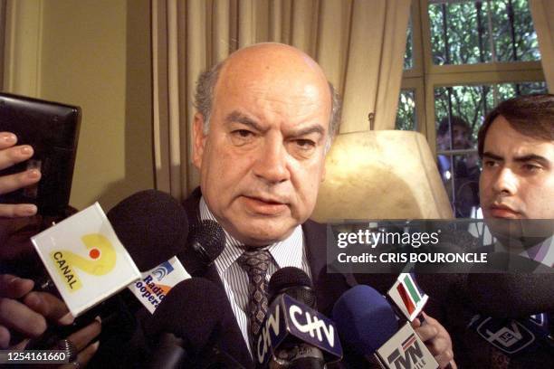 Chilean Foreign Minister Jose Miguel Insulza speaks to the press 26 November in Santiago about the arrest in London of former Chilean dictator Gen....