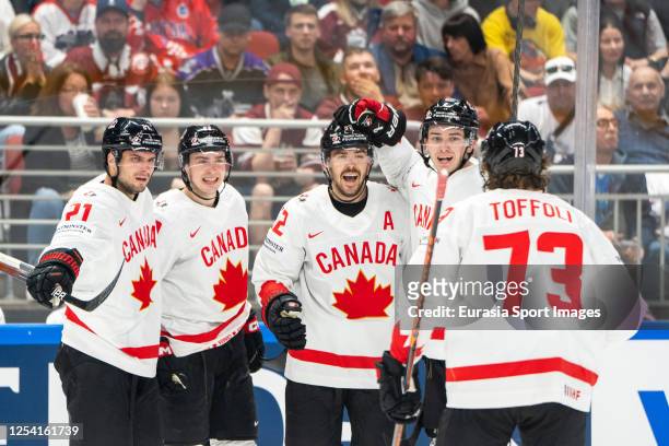 MacKenzie Weegar of Canada celebrated for his goal by Cody Glass of Canada , Scott Laughton of Canada Jack Quinn of Canada and Tyler Toffoli of...