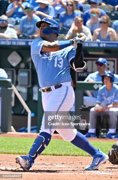 Kansas City Royals catcher Salvador Perez hits a solo home run in the first inning during an MLB game between the Oakland Athletics and the Kansas...