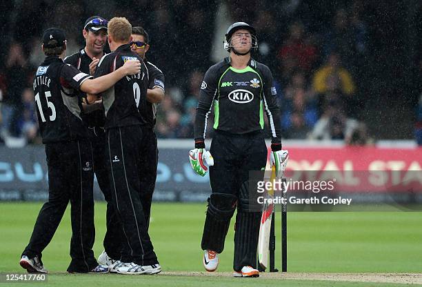 Jason Roy of Surrey leaves the field after being dismissed by Steve Kirby of Somerset during the Clydesdale Bank 40 Final between Surrey and Somerset...