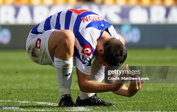 Joey Barton of Queens Park Rangers shows his frustration, after his shot goes wide of the goal during the Barclays Premier League match between...