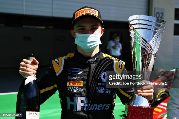 Race winner Oscar Piastri of Australia and Prema Racing celebrates in parc ferme during the feature race for the Formula 3 Championship at Red Bull...