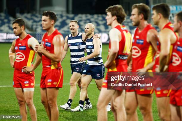 Joel Selwood of the Cats and Gary Ablett of the Cats walk off together after playing their 300th and 350th games respectively after the round 5 AFL...