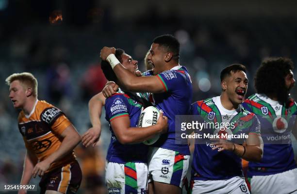 Isaiah Papali'i of the Warriors celebrates after scoring a try during the round eight NRL match between the New Zealand Warriors and the Brisbane...