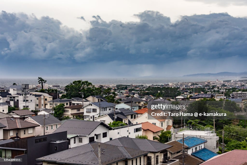 Storm clouds on the residential district by the beach in Kanagawa prefecture of Japan