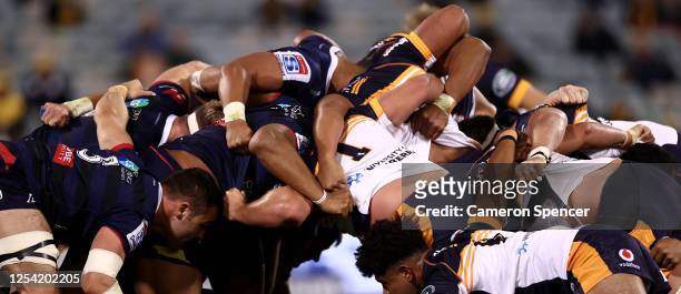 Rebels and Brumbies forwards pack a scrum during the round one Super Rugby AU match between the Brumbies and the Rebels at GIO Stadium on July 04,...
