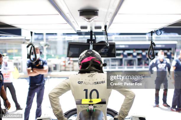 Pierre Gasly of France and Scuderia AlphaTauri gets into his car during final practice for the Formula One Grand Prix of Austria at Red Bull Ring on...