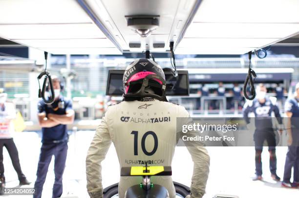 Pierre Gasly of France and Scuderia AlphaTauri gets into his car during final practice for the Formula One Grand Prix of Austria at Red Bull Ring on...