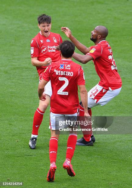 Joe Lolley of Nottingham Forest celebrates after scoring his sides first goal with team mates Samba Sow and Yuri Ribeiro during the Sky Bet...