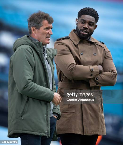 Sky TV presenters Micah Richards and Roy Keane before the Premier League match between Manchester City and Liverpool FC at Etihad Stadium on July 2,...