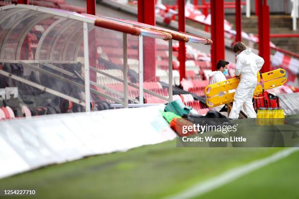 The ambulance service prepares ahead of the Sky Bet Championship match between Brentford and Wigan Athletic at Griffin Park on July 04, 2020 in...