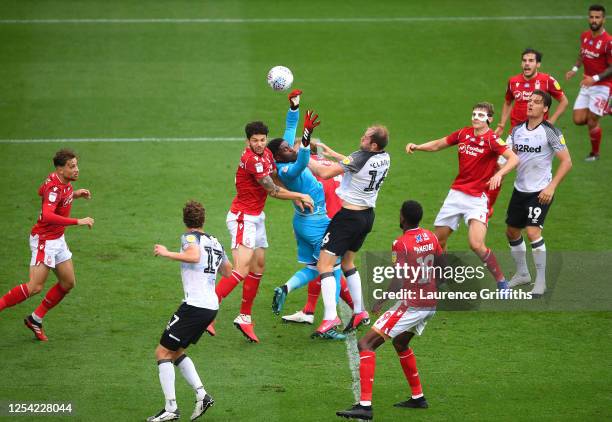 Brice Samba of Nottingham Forest fails to claim the ball leading to Chris Martin of Derby County scoring his sides first goal during the Sky Bet...