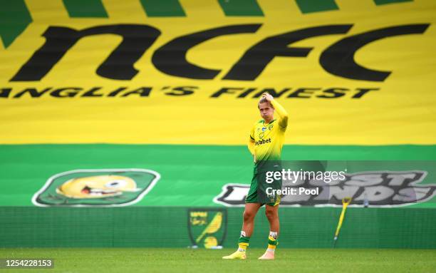 Todd Cantwell of Norwich City looks dejected following his sides defeat in the Premier League match between Norwich City and Brighton & Hove Albion...