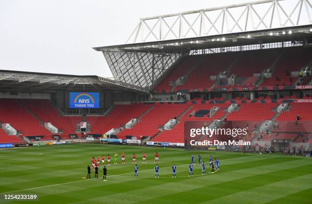 The players and officials applaud the NHS prior to kick off during the Sky Bet Championship match between Bristol City and Cardiff City at Ashton...