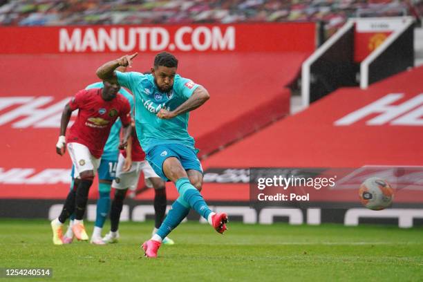 Joshua King of AFC Bournemouth scores his team's second goal from a penalty during the Premier League match between Manchester United and AFC...