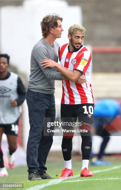 Saïd Benrahma of Brentford FC is congratulated by manager, Thomas Frank after scoring his sceond goal during the Sky Bet Championship match between...