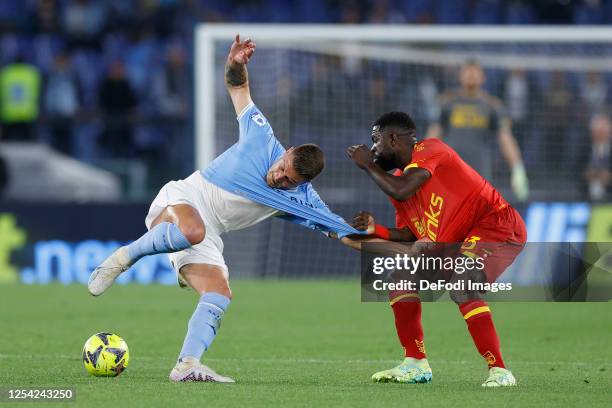 Sergej Milinkovic-Savic of SS Lazio and Samuel Umtiti of US Lecce battle for the ball during the Serie A match between SS Lazio and US Lecce at...