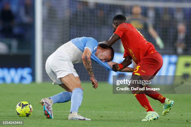 Sergej Milinkovic-Savic of SS Lazio and Samuel Umtiti of US Lecce battle for the ball during the Serie A match between SS Lazio and US Lecce at...