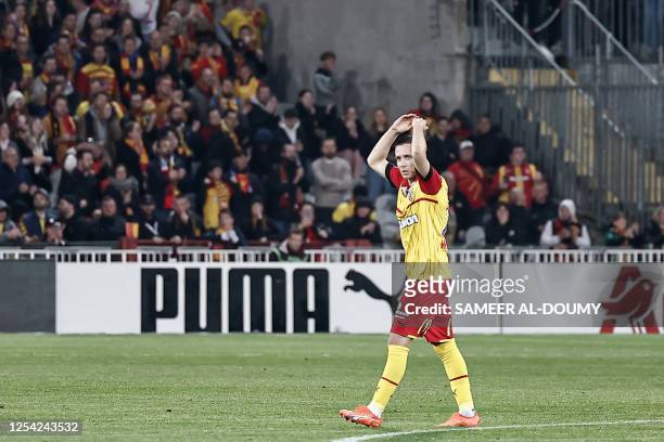 Lens' Polish midfielder Przemyslaw Frankowski celebrate after scoring a penalty kick during the French L1 football match between RC Lens and Stade de...