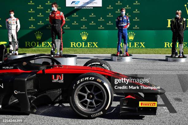 Race winner Callum Ilott of Great Britain and UNI-Virtuosi Racing, second placed Marcus Armstrong of New Zealand and ART Grand Prix and third placed...