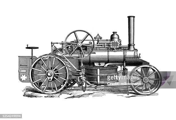 old engraved illustration of steam plow tractor - industrial revolution 個照片及圖片檔
