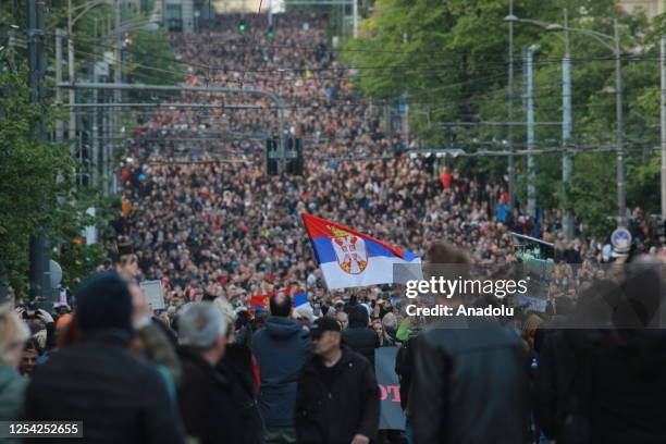 People march during a protest held against violence in Serbian society following two mass shootings in Belgrade, Serbia, on May 12, 2023.