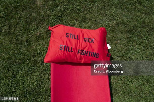 Cot and personalized pillowcase on the National Mall during a demonstration in Washington, DC, US, on Friday, May 12, 2023. The 500-cot installation...