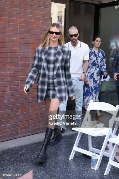 Behati Prinsloo and Adam Levine at the star ceremony where Blake Shelton is honored with a star on the Hollywood Walk of Fame on May 12, 2023 in Los...
