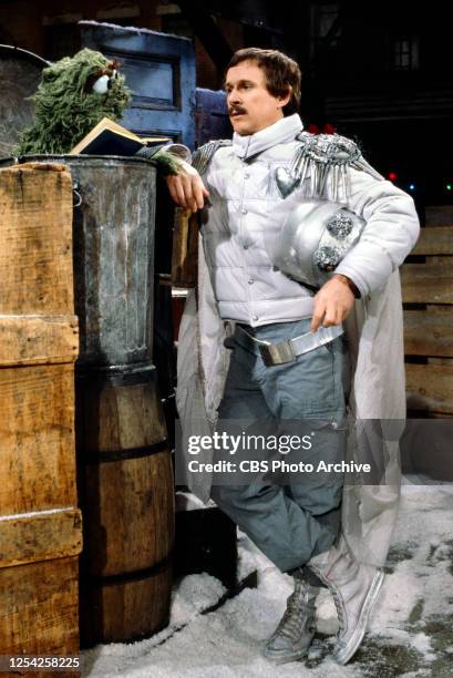 Special Sesame Street Christmas. A CBS television special. December 8, 1978. Pictured is Dick Smothers wih Oscar the Grouch.