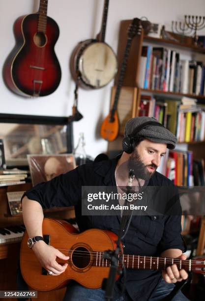 Musician Daniel Kahn livestreams his performance from his apartment as his contribution to the JetLag festival on July 04, 2020 in Berlin, Germany....