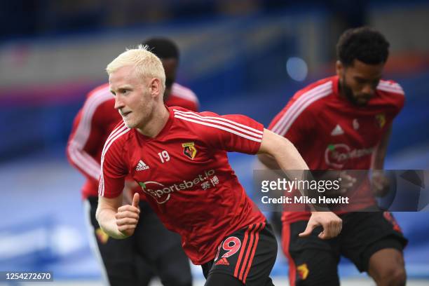 Will Hughes of Watford warms up prior to the Premier League match between Chelsea FC and Watford FC at Stamford Bridge on July 04, 2020 in London,...