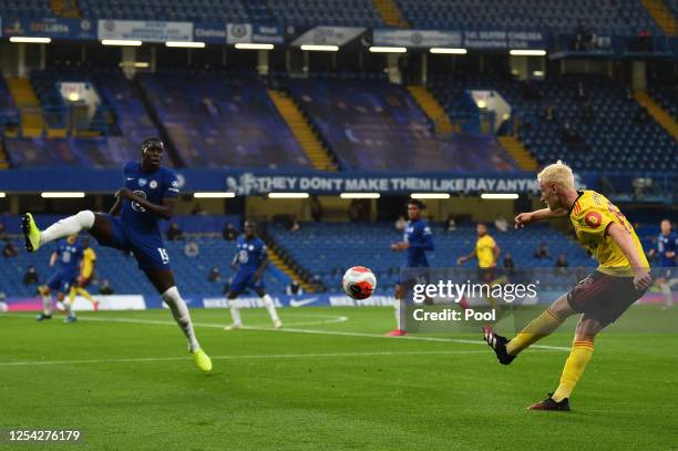 Will Hughes of Watford crosses the ball during the Premier League match between Chelsea FC and Watford FC at Stamford Bridge on July 04, 2020 in...