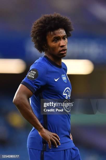 Willian of Chelsea looks on during the Premier League match between Chelsea FC and Watford FC at Stamford Bridge on July 04, 2020 in London, England....